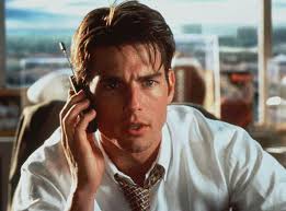 Tom Cruise plays struggling sports agent Jerry Maguire.