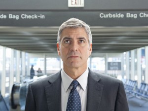 George Clooney plays hired gun corporate layoff expert Ryan Bingham in Up in the Air.